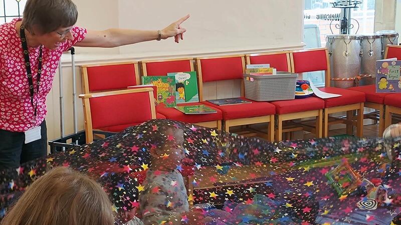 Children enjoying an interactive activity during the session.