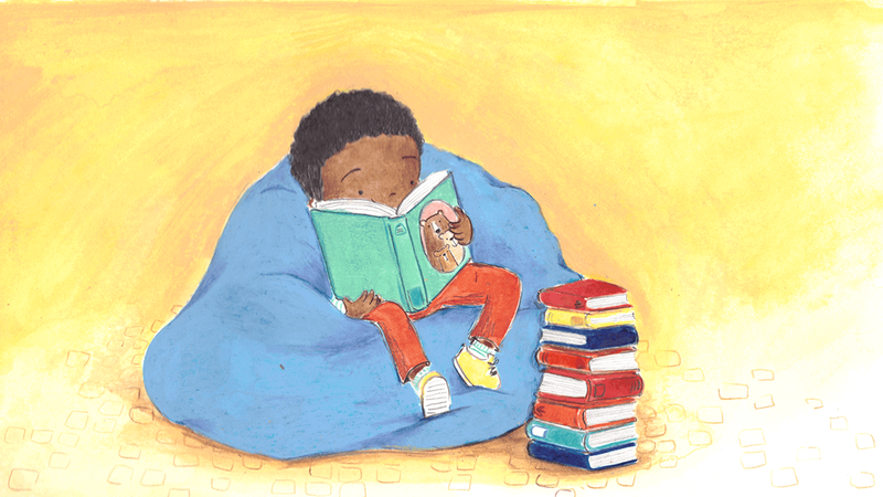 A illustration of a boy sat on a beanbeag reading, next to a big pile of books.