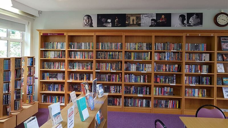 A school library showing many books on shelves