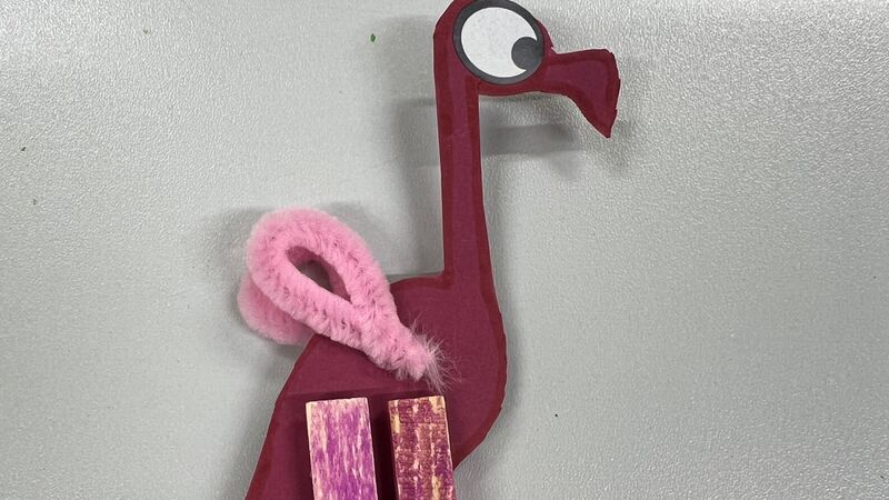 A photo of a flamingo created by a child in a craft session