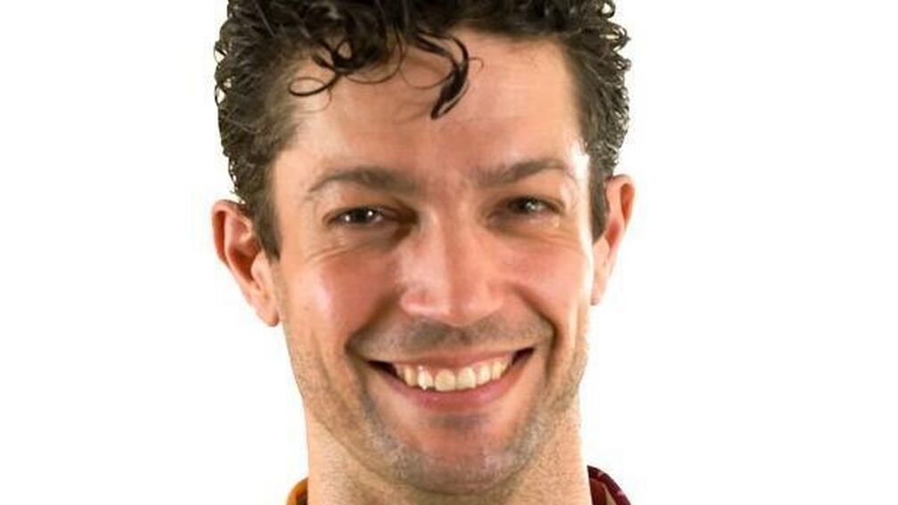 close up of man (Chip Colquhoun) smiling