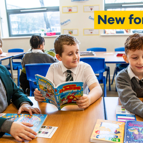 Children with books in a classroom with text 'New for 2026 Bookbuzz Primary'