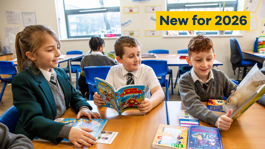Children with books in a classroom with text 'New for 2026 Bookbuzz Primary'