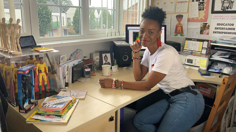 Yelitza Smith sitting at her desk