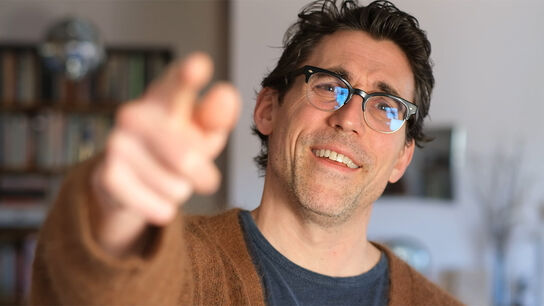 Tom Percival pointing at the camera