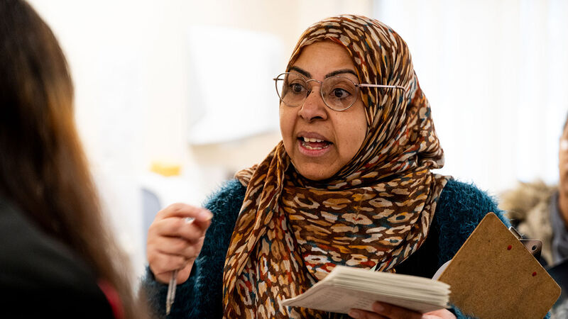 Azra Bashir speaking to families