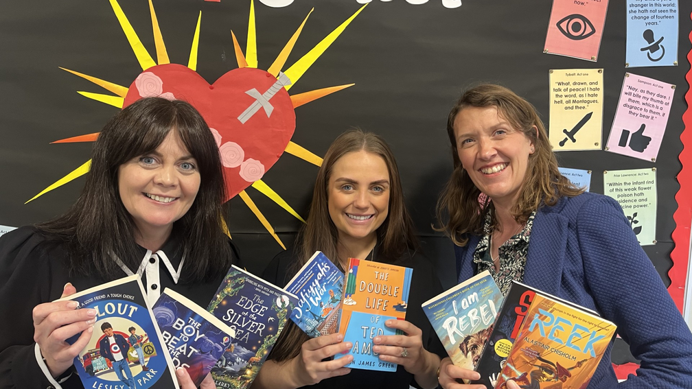 Teachers Nicky, Megan and Becky holding Bookbuzz Secondary books