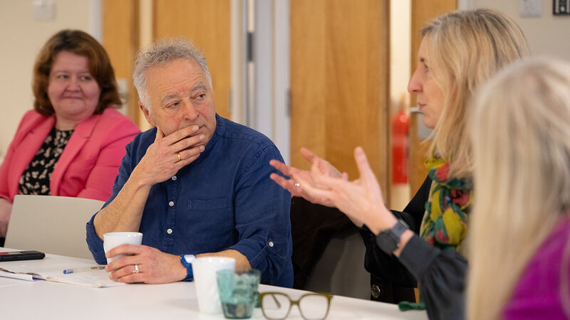 Frank Cottrell-Boyce listening to practitioners at a meeting in Barnsley