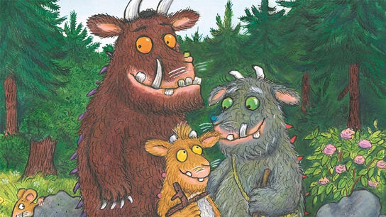 An illustration from the front cover of Gruffalo Granny, featuring three smiling Gruffalo monsters