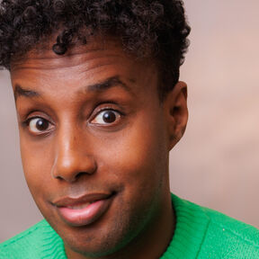 Ramzee looking to camera, smiling.