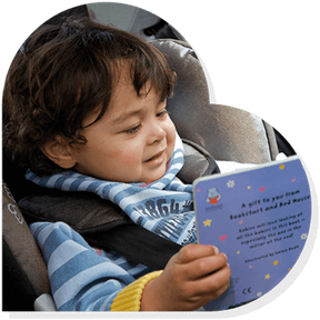 Boy reading book in a heart shaped image