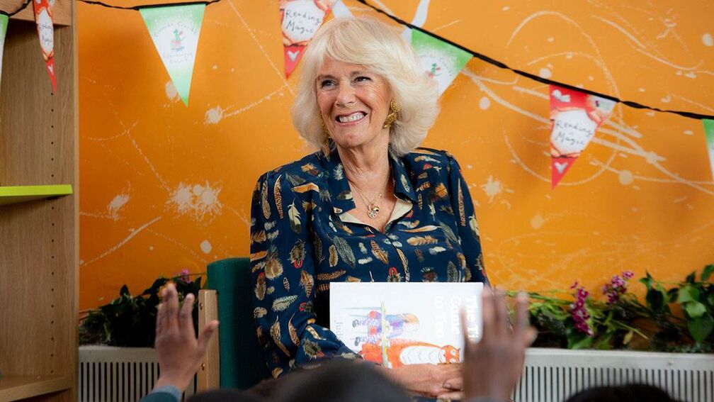 HRH the Duchess of Cornwall smiling during a visit to a primary school.