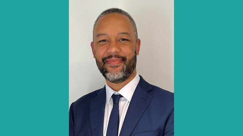 Ed, looking to camera, smiling.