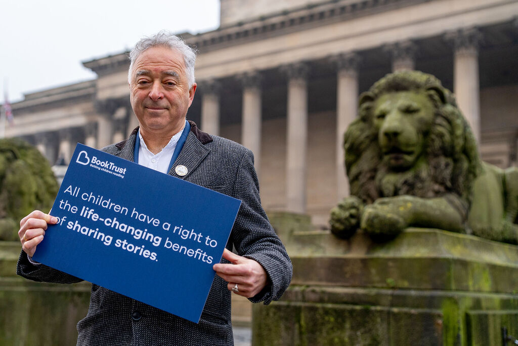 Reading Rights Summit FCB outside with card