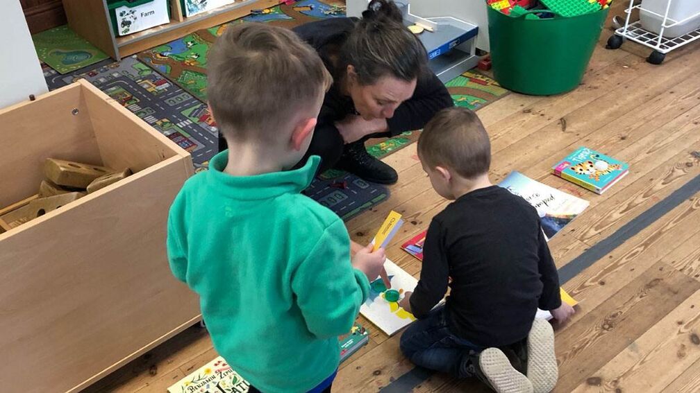 Children with books at Chew Valley