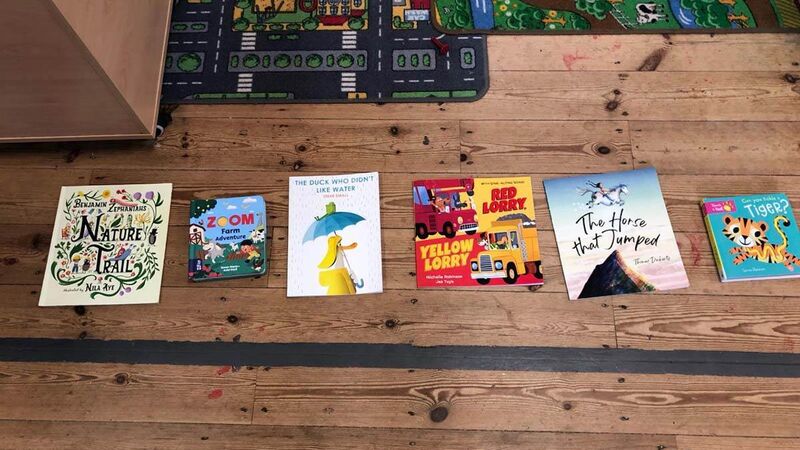 Books laid out on the floor at Chew valley