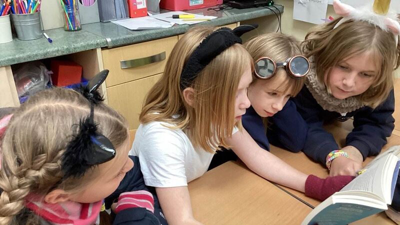Children reading in a book club