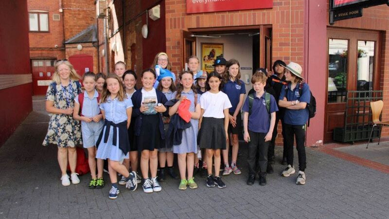 Children on a book club trip